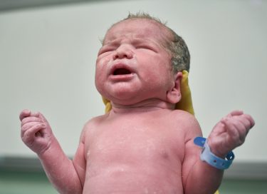 Photo of newborn baby for article by Dr Anne Malat called 'This is going to hurt'